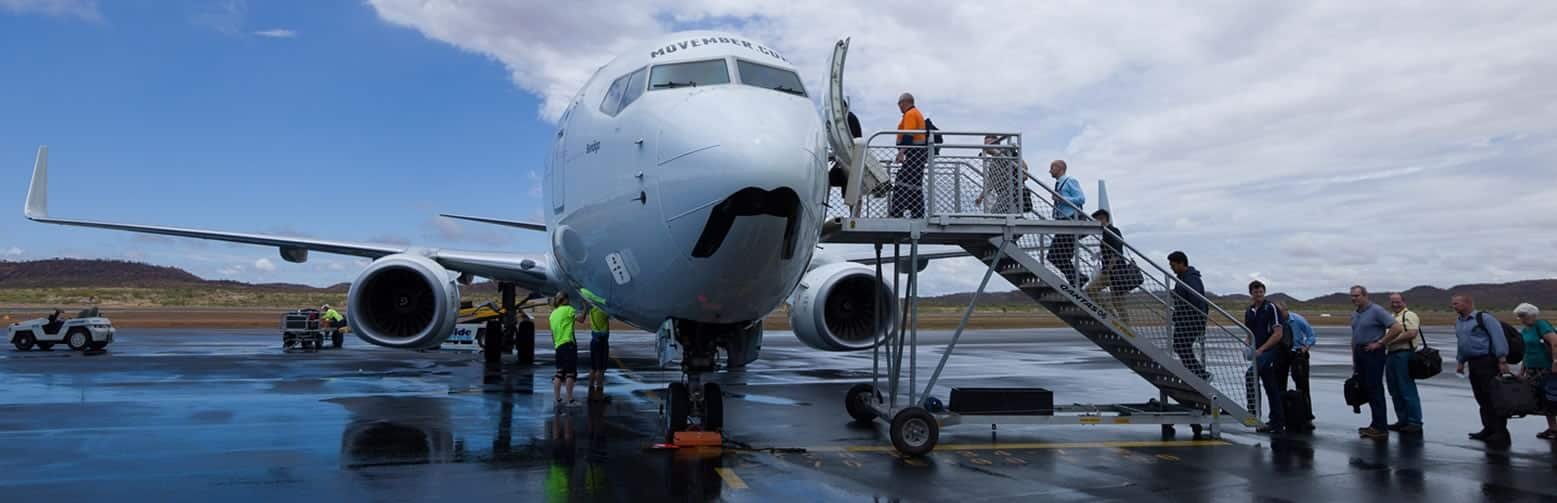 Passengers boarding a 737 on the Mount Isa apron